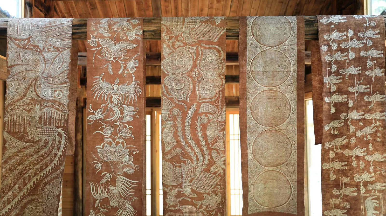 The Intricate Weaving of Miao Brocade: Craftsmanship and Cultural Heritage