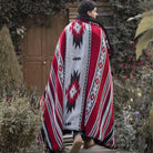 A model with colorful king-size faux fur duvet cover. Multi-functional blanket with diamond shape on one side.