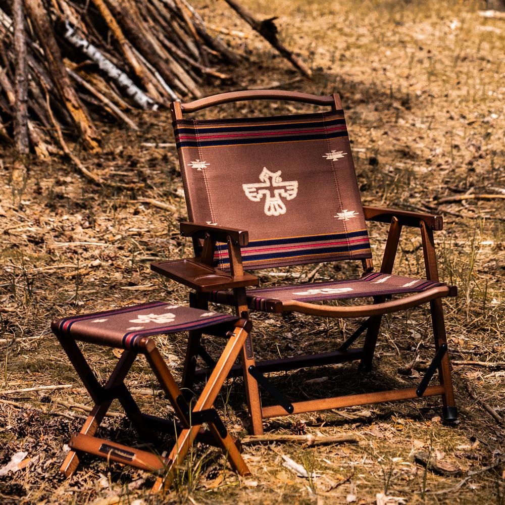 An Anifurry wood outdoor chair and stool with patterned thunderbirds