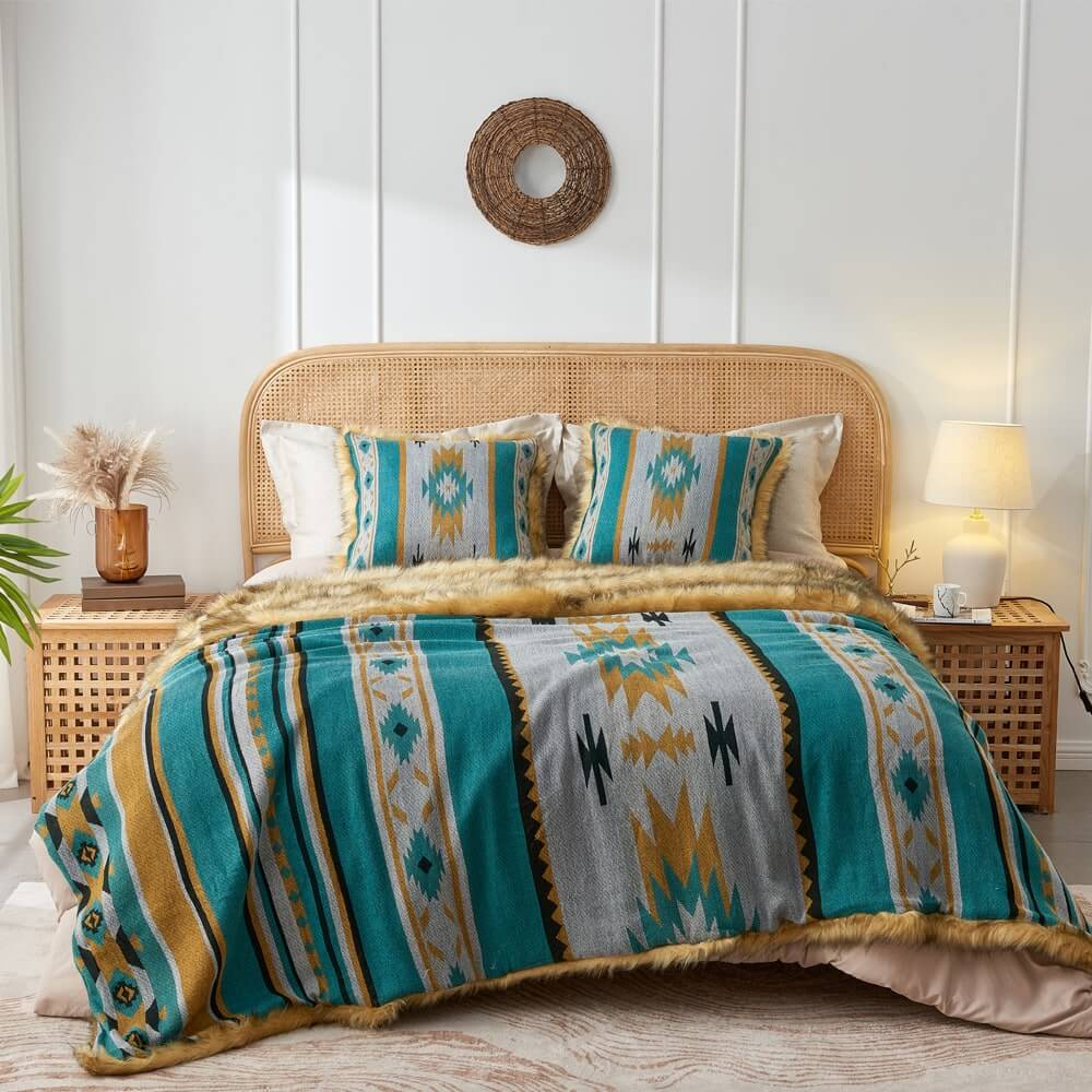 A photo of a bed in the bedroom with an Aztec-style faux fur blanket and pillow cover