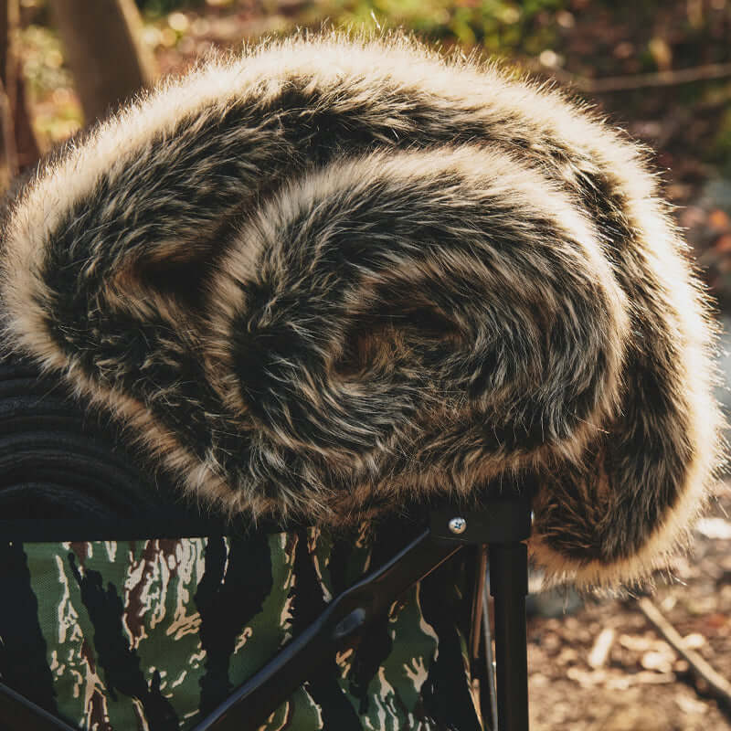 The brown faux fur rug is soft and comfortable for outdoor use and has a non-slip surface.