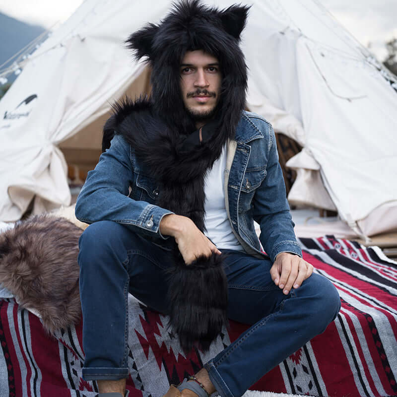 The model is wearing a black faux fur hood with a scarf and gloves. It's extremely warm and keep you away from coldness.