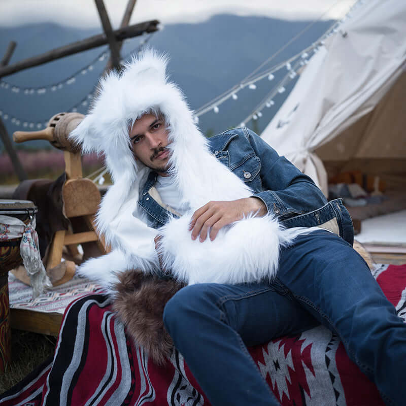 The white faux fur hood with wolf ears has unbelievable soft material and 100% cruelty-free luxurious faux fur.