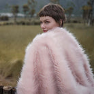 The king size long pile pink faux fur blanket has unbelievable soft velvet lining and 100% cruelty-free luxurious fur.