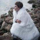 The white faux fur blanket is great for both decoration and keeping warm. It's easy to wash and extremely soft.