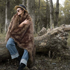 The brown faux fur blanket is great for both decoration and keeping warm. It's easy to wash and extremely soft.
