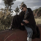 The black faux fur blanket is great for both decoration and keeping warm. It's easy to wash and extremely soft.