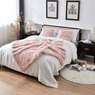 A small size fluffy pink faux fur blanket, which is multi-functional and easy to wash. Suitable for keeping warm and decorating rooms.