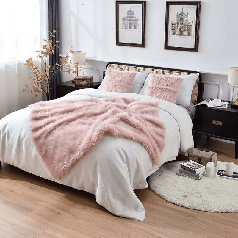 A small size fluffy pink faux fur blanket, which is multi-functional and easy to wash. Suitable for keeping warm and decorating rooms.