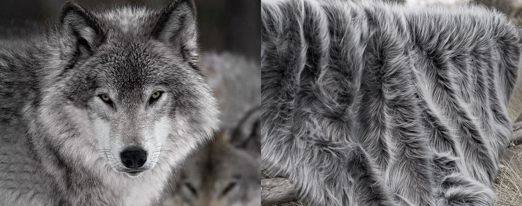 A fluffy grey long pile faux fur blanket that looks and feels like real fur from a grey wolf.