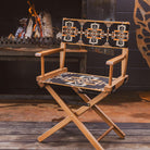 Anifurry Mohave director chair with a patterned seat and backrest in front of a fireplace