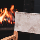 Close-up of an Anifurry Beige Moab Director Chair patterned backrest