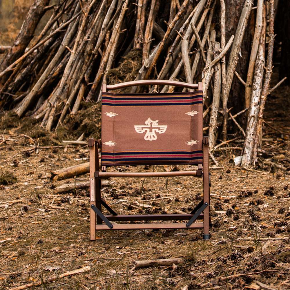Front view of Anifurry wood camping chair with a thunderbird-patterned.