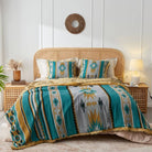 The bright bedroom was covered with reversible Turquoise aztec and golden faux fur sets on the bed.