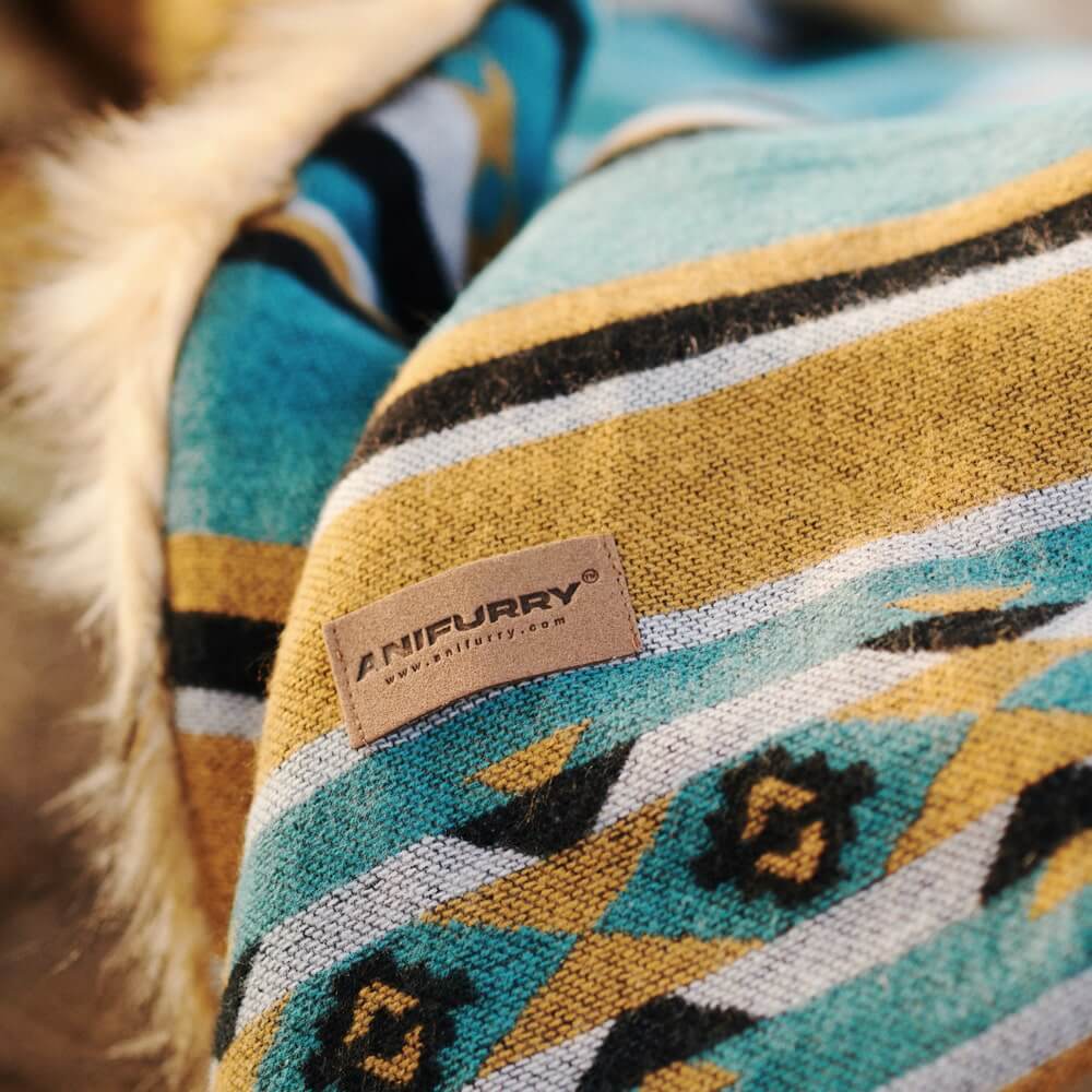 A close up of a high-end Reversible Aztec Faux Fur Throw Blanket.