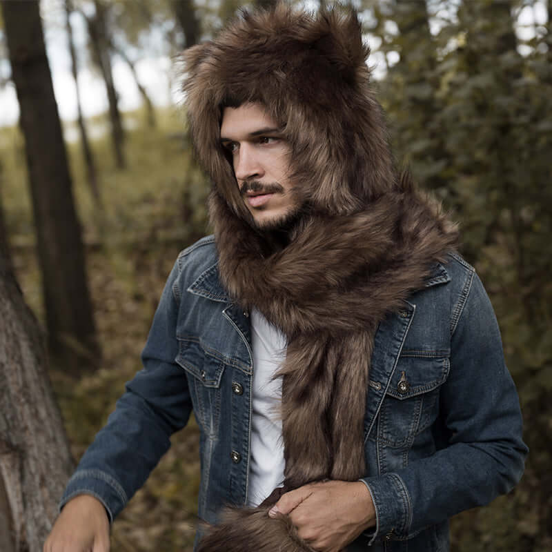 The model wearing an extremely soft brown faux fur hood, which is machine washable and easy to clean.