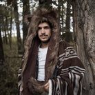 A fluffy brown faux fur hood, just like real bear fur. Long pile faux fur hood bringing a wild lifestyle to you.