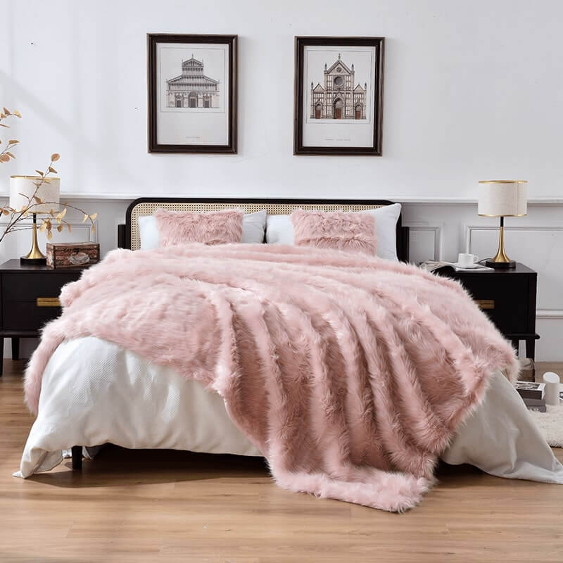The pink faux fur blanket is great for both decoration and keeping warm. It's easy to wash and extremely soft. Queen size and king size are available.